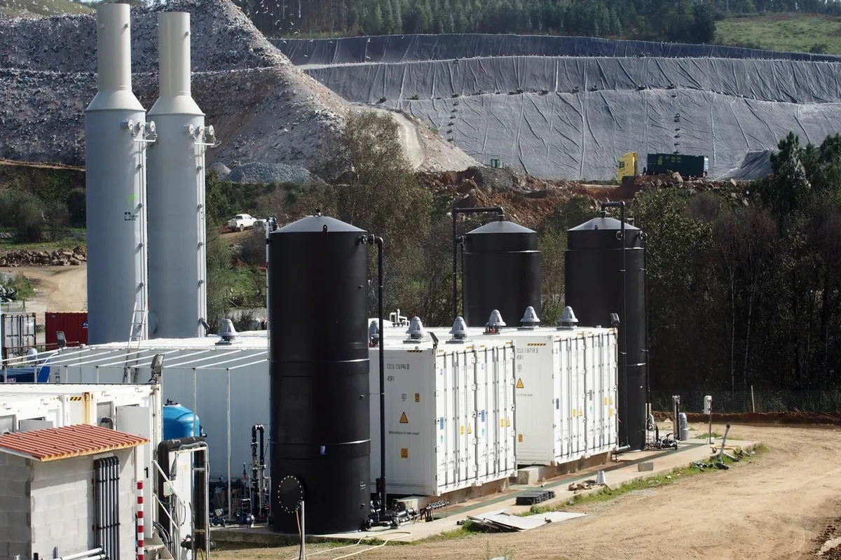 Exterior view of the leachate treatment plant in Galicia, featuring container modules and tanks