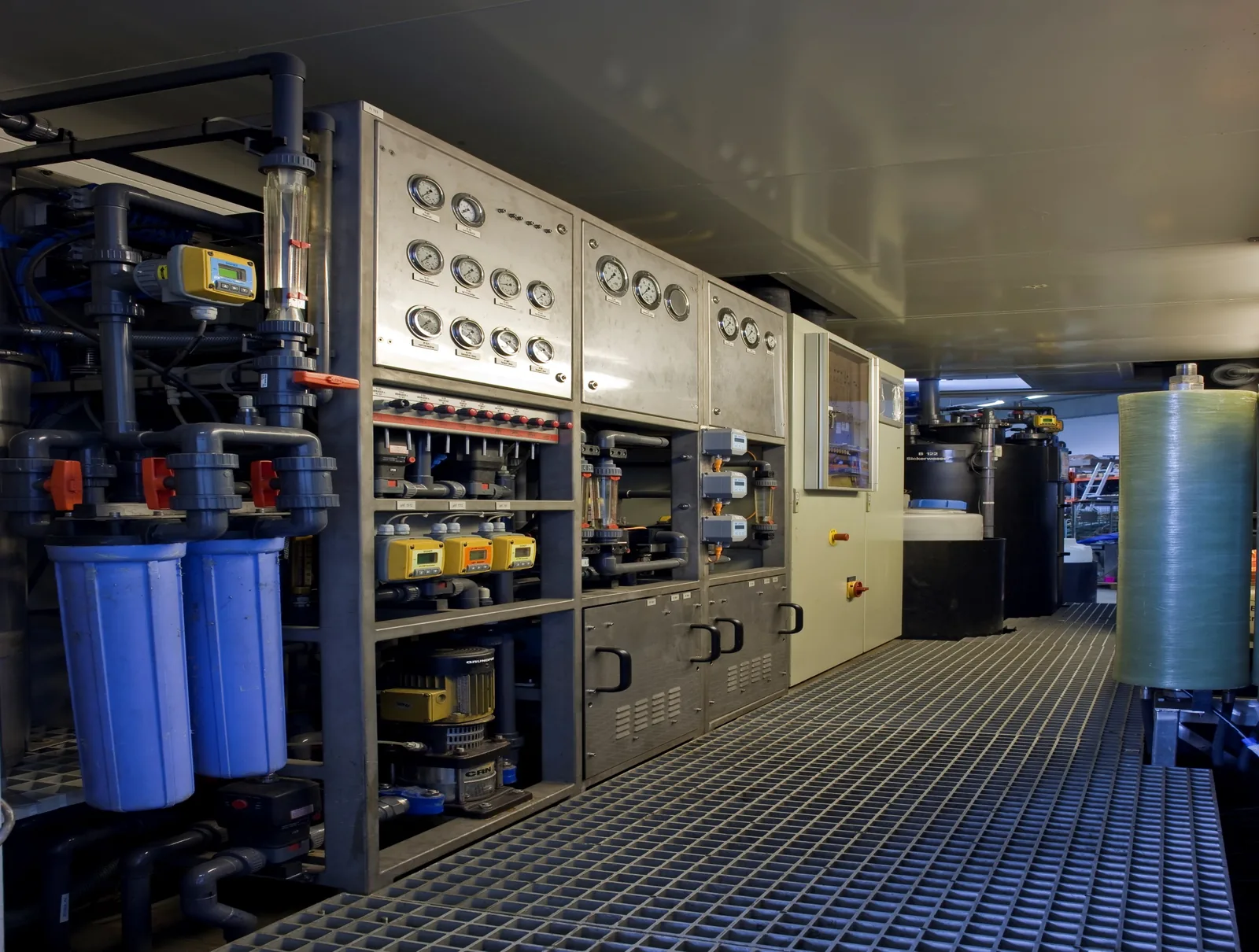 Gauge panel, flow meters and filters inside the container of an RCDT plant